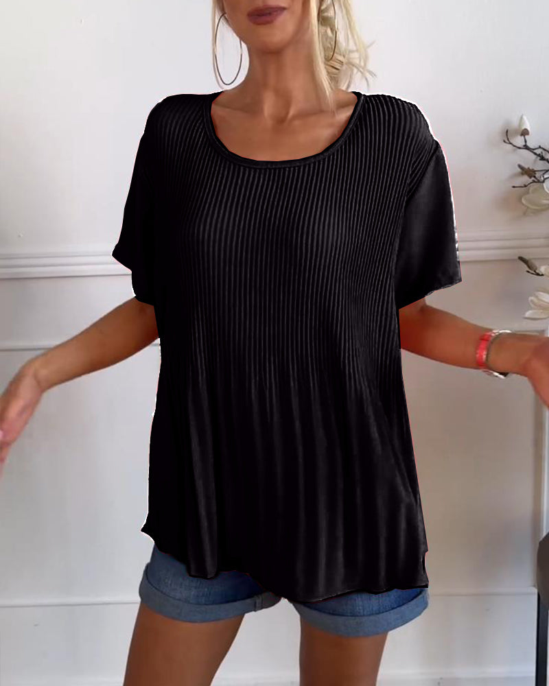 Blusa plissettata tinta unita con scollo tondo