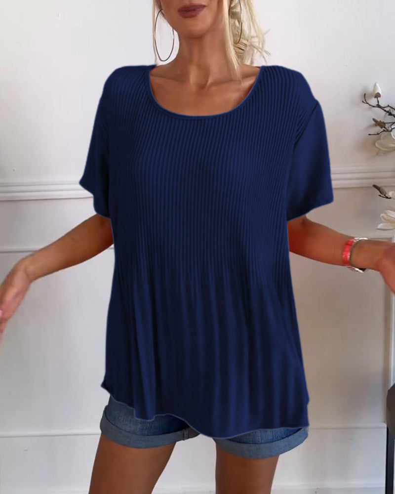 Blusa plissettata tinta unita con scollo tondo